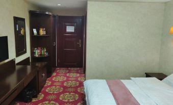 Wuchuan Wanjin Business Hotel