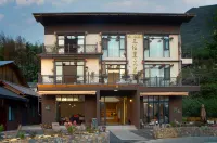 asclepion Hotels near Shiyi Qiang Village