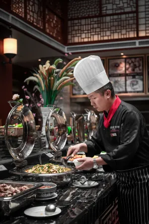 JP Hyllis Hotel Отели рядом с достопримечательностью «Ancient Town of Yi People»