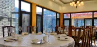Daocheng Yading Sangjie Linka Luxury Homestay - Frühstück