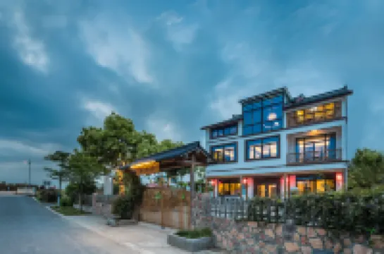 Suzhou Guxiang Residence (North Taihu Tourism Resort Changzhouyuan Wetland Park Branch) فنادق في 