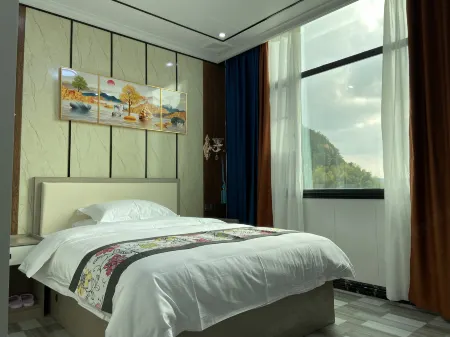 Sunshine Guest House Отели рядом с достопримечательностью «Sanbaishan Mountain Scenic Area»