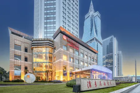 Ramada Plaza by Wyndham Pudong Отели рядом с достопримечательностью «Shanghai Di'er Gongye University»