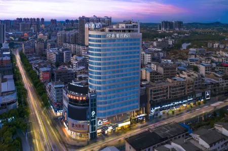 Lvyi Yazhi Hotel (Changning Dongfeng Square) Отели в г. Чаннин