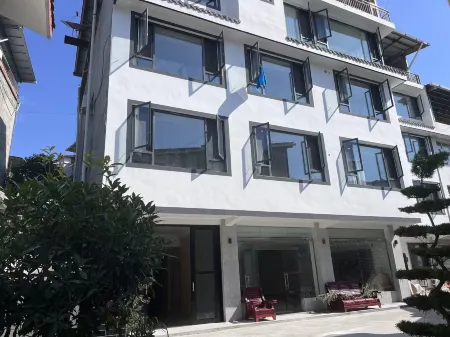 Shili Qingchuan Homestay Отели рядом с достопримечательностью «Shuimo Ancient Town»