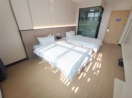 Dongzhi Xiangxu Yijia Hotel Отели в г. Дунчжи