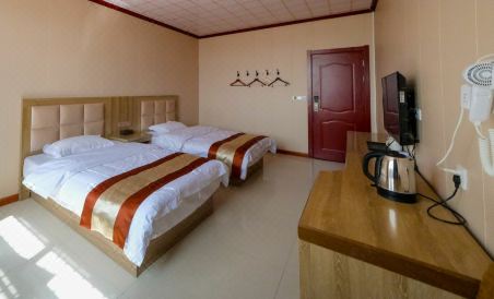 Golmudya Dansai Shang Hotel - Housity