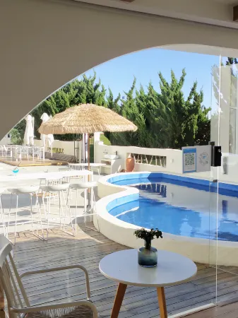 Dalian Jiuqi Blue Coast B&B Отели рядом с достопримечательностью «Xinghai Square Recreation Ground»