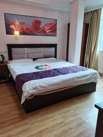 Xiongbaiyue Hotel Отели в г. Чженьсюн