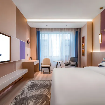 Campanile Hotel (Zhaotong Youth Road Financial Center Store) Отели в г. Чжаотун