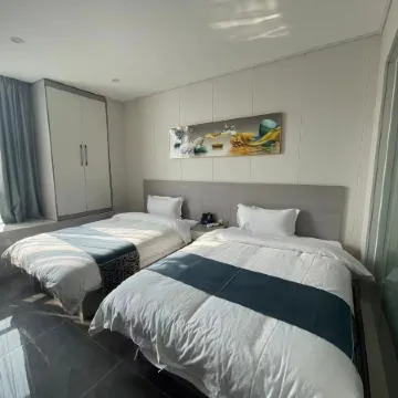 Tian Luo Business Apartment Отели рядом с достопримечательностью «Guangzhou Flying Over the Jungle Adventure Park»