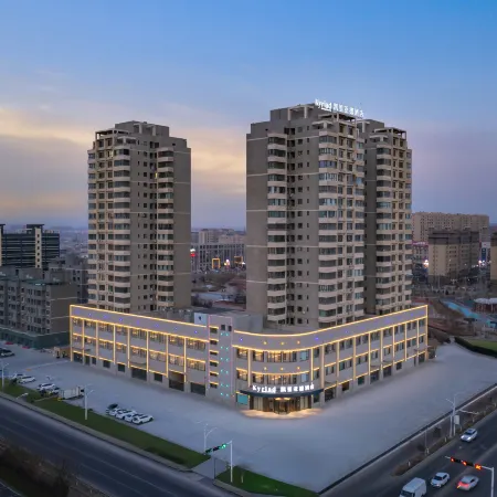Kyriad Marvelous Hotel Hami Gongyuandaguan Community Manjie Life Plaza Отели в г. Хами