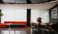 Wozhou Yueju Hotel (Xinchang Wanda Plaza)