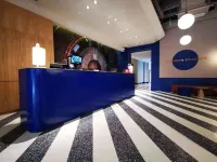 baseLITE HUANGXING Serviced Apartment Отели рядом с достопримечательностью «Янпу»