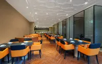Vienna International Hotel (Gangcheng Economic and Trade Building) - Parkplatz