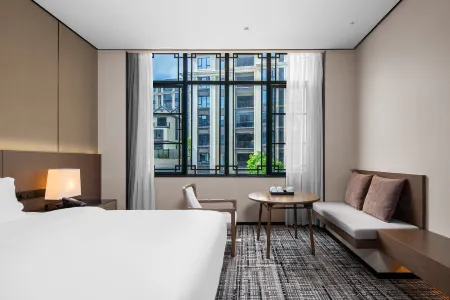 Wellton International Hotel Отели в г. Динань