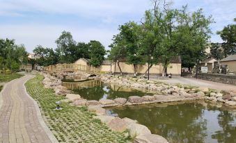 Xinjinlong Holiday Hotel (Linzhou Long'an Road Bus Station)