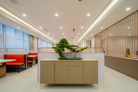 Rezen Manhu Hotel Rongcheng Railway Station Отели в г. Жунчэн