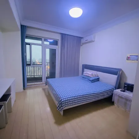 Happy Hour Seaview Apartment (Bayuquan Hongji Branch)