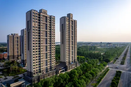 Left Bank Hotel (Qihe County Oulebao Marine Polar World) Отели в г. Цихэсянь