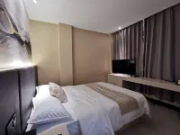Jiangmen Huayue Boutique Apartment (Jiangmen East Station Branch) - Condos