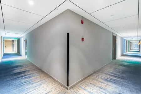 Ai Fei Hotel (Yantai University Yingchun Street) Отели рядом с достопримечательностью «Wenjing College Yantai University»