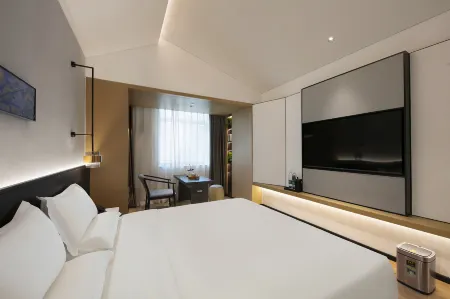 Juyue Hotel (Zhengzhou East Railway Station Provincial Government) Отели рядом с достопримечательностью «Henan Police College (Longzihu East Road)»