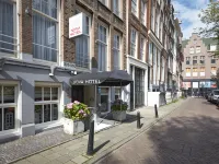 Nova Hotel Hoteles cerca de Plaza Dam