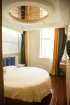 Hangjin Houqi Zichen Hotel Hôtels à : Bannière arrière de Hanggin