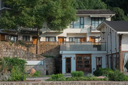 xinbo nanshan homestay Отели рядом с достопримечательностью «Nanshan Botanical Garden»