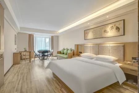 Manju Hotel (Harbin West Railway Station Wanda) Отели рядом с достопримечательностью «Heilongjiang University»