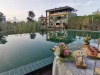 Future Homestay （Xingyi Wanfenglin Store） - Swimmingpools