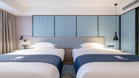 Echarm Hotel (Hechi Yizhou Municipal Center Plaza) Отели в г. Хэчи