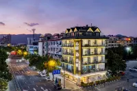 Half Summer Hotel Отели рядом с достопримечательностью «Цюньмин Сен-Парк Шай-Ху»