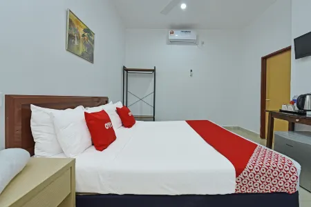 OYO 90809 Homestay Black Pink Merah Jambu Syariah