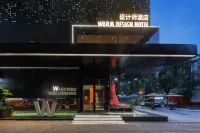 W Design Hotel (Qinyang Bus Station) Отели рядом с достопримечательностью «Кокс-Кокс-Колледж современной техники и техники»