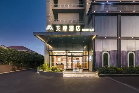 Ai Fei Hotel (Shanghai Baoan Highway Subway Station Shuichan West Road Branch) Отели рядом с достопримечательностью «Shanghai Jiguang Polytechnic College»