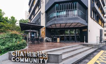 The restaurant has an outdoor patio area with tables and chairs in front of its entrance at CitiGO Hotel Jing'an Shanghai