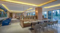 Chufan River View Hotel (Xishuangbanna Jinghong Gaozhuang Xishuangjing Star Night Market) - sarapan
