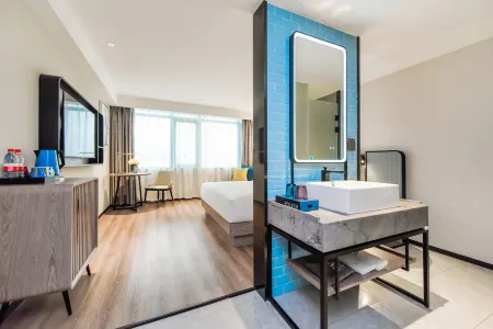 Echarm Hotel (Shuanglong Konggang Logistics Park) Отели в г. Лунли