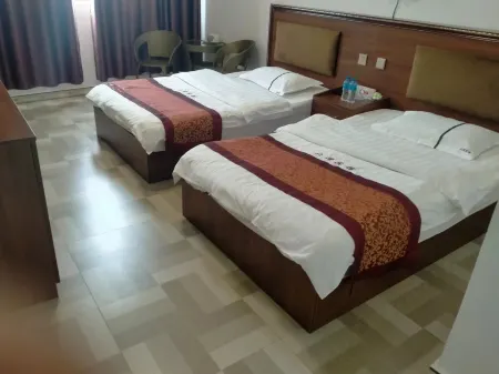 Dawan Hotel Отели в г. Lvchun