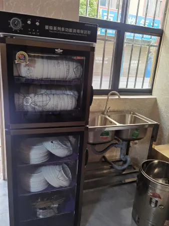 Muxuan Hotel (Vocational Education Park) Отели рядом с достопримечательностью «Qujing Bund Cultural Tourism Scenic Area»