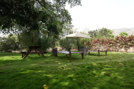 Indira Farms Отели в г. Sancordem VP