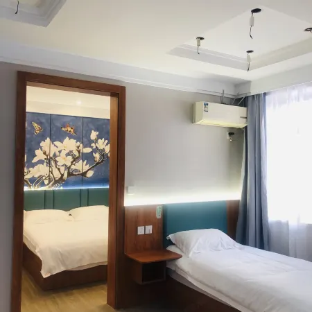 Harbin Blog Hotel Отели рядом с достопримечательностью «Колледж Jiangnan-Библиотека Университета Мастера Харбина»