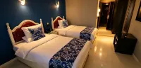 Xintai Shengshi Lotus International Hotel - 2-نجوم