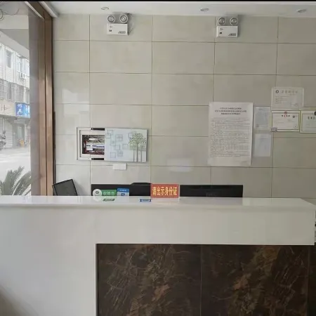 Xinjia Business Hotel