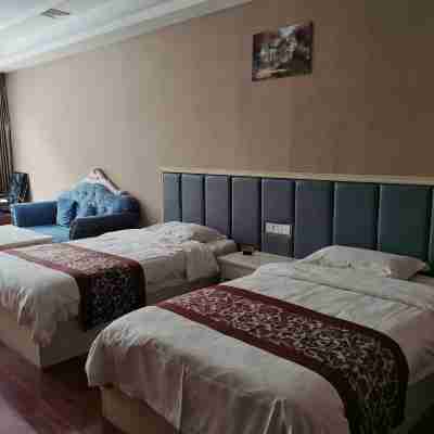 Pingchang Huangpu Business Hotel Rooms