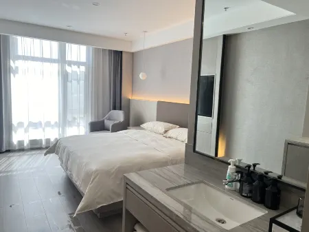 Oasis Hotel Отели рядом с достопримечательностью «Народное правительство Ганкуй»