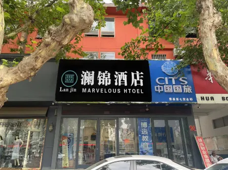 Lanjin Hotel (Fei County Jianshe Road Oriental Shopping Plaza) Отели рядом со станцией Feixianbei Railway Station