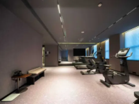 Turpan Guotai Minsheng Plaza Junmin Gongjian Lyuaduo Hotel